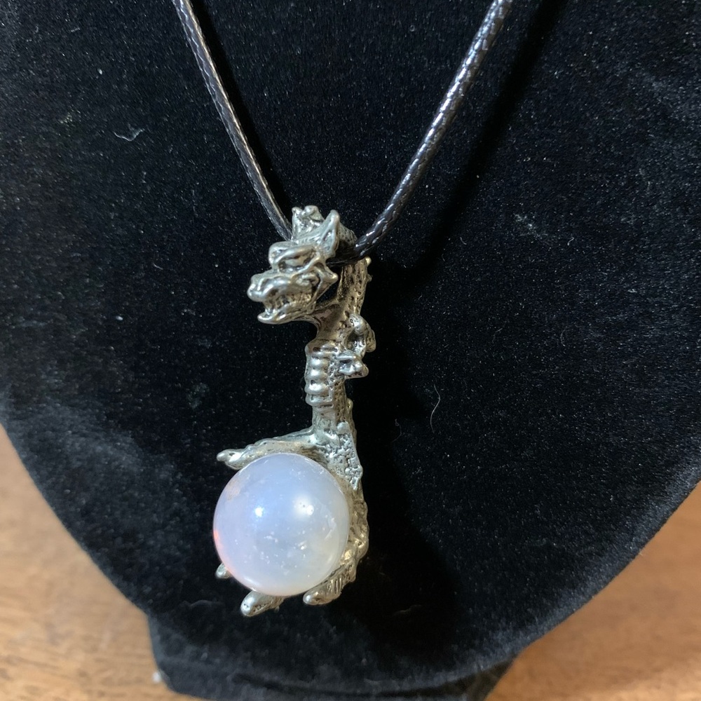 Dragon holding crystal ball necklace